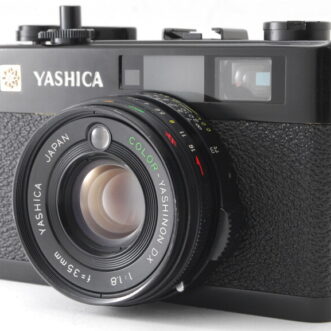 PROMOTION. OPTICS NEAR MINT Yshica Electro 35 CC Black 35mm Film Range Finder, Lens Cap 光學近乎完好 Yashica Electro 35 CC 黑色 35 毫米膠卷測距儀，鏡頭蓋